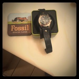 Fossil watch with leather band.